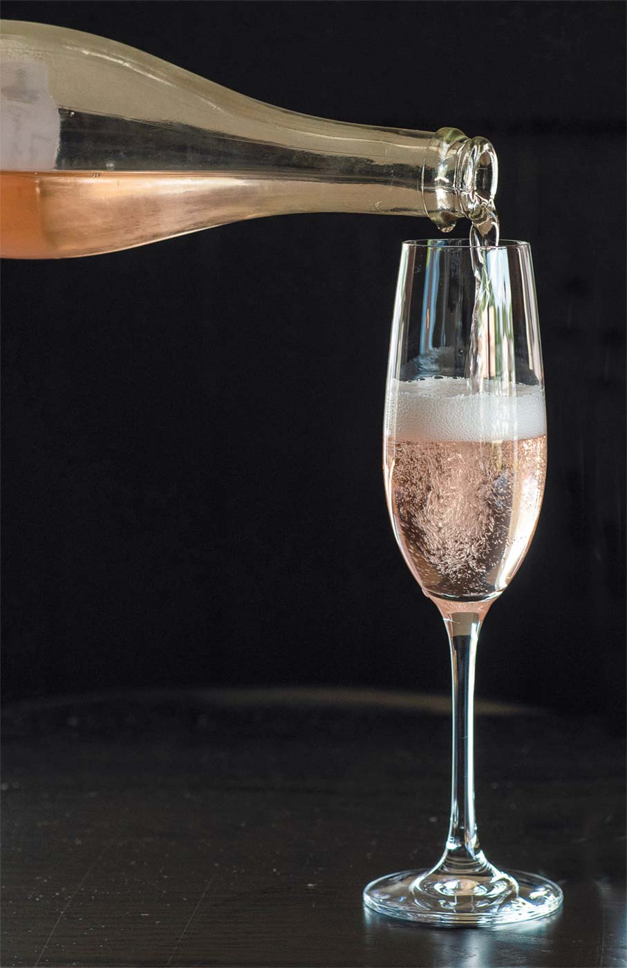 pouring sparkling wine