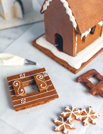 constructing a gingerbread house