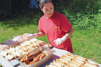 freshly grilled hot dogs from Union Pork Store, ready for tour goers