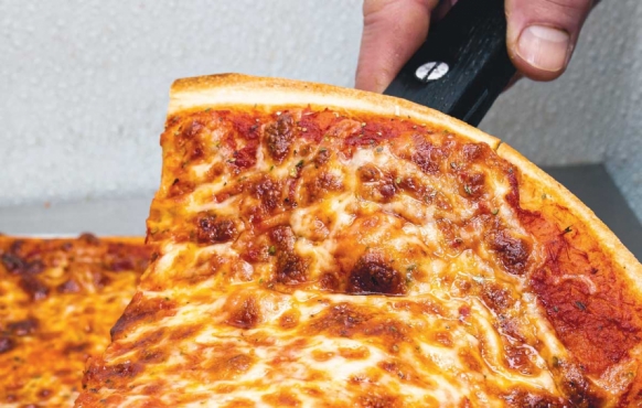 a slice of Bonvini's pizza