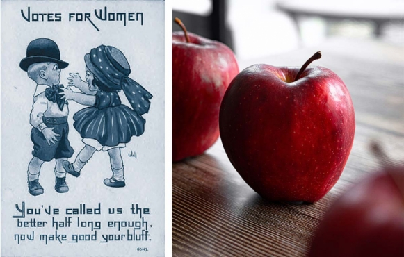 Votes for women poster next to a shiny red apple