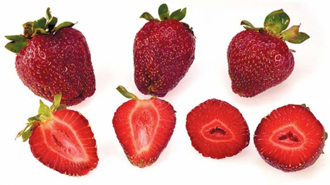 whole and sliced strawberries