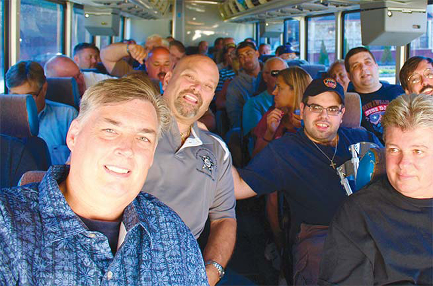Erwin Benz (left) and John Fox (right) with a busload of New Jersey Hot Dog Tour goers