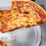 a slice of Bonvini's pizza